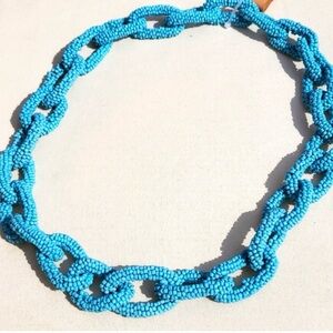 Turquoise beaded necklace.